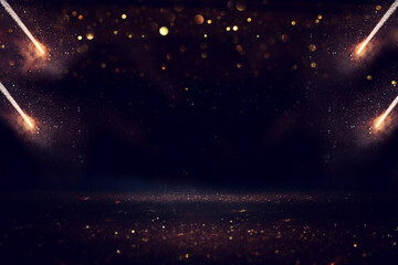 background of abstract black and gold glitter lights with fireworks. defocused