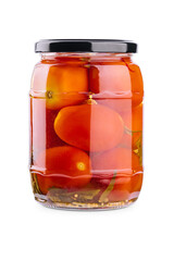 Pickled tomatoes in glass jar on white background