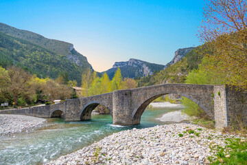Fototapeta na wymiar Medieval bridge over the river Esca in Burgi, Navarre