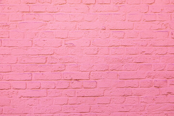 Fototapeta na wymiar pattern of harmonic painted pink brick wall