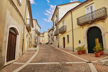 Fototapeta na wymiar A small street between the houses of Frigento, a rural village in the province of Avellino in Italy. 