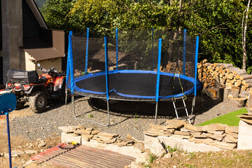Big trampoline for children and adults. Outdoor Trampoline with safety net with Zipper entrance.