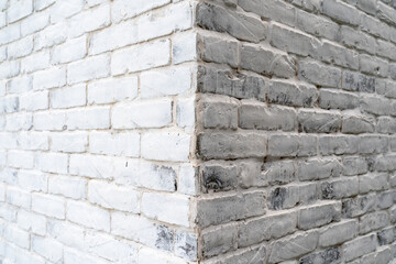 Brick wall wallpaper texture clinker and concrete pattern in old vintage white colour theme under the constuction area
