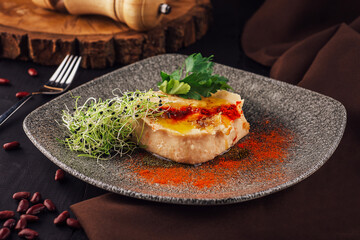 Hummus with olive oil and paprika