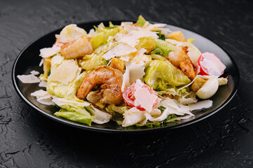 Caesar salad with grilled shrimp and parmesan cheese