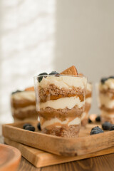 Pastries with pears and berries on the table