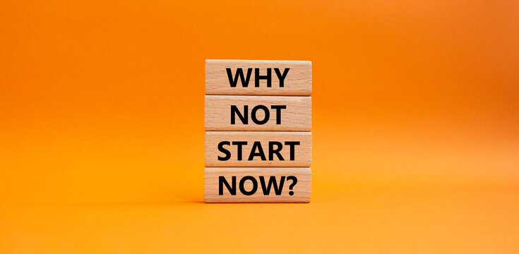 Why not start now symbol. Concept words Why not start now on wooden blocks. Beautiful orange background. Business and Why not start now concept. Copy space.