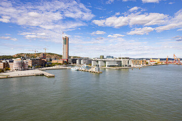 Fototapeta premium Gothenburg harbor with traffic and activity - cranes and ships/boats, Sweden,Scandinavia,Europe