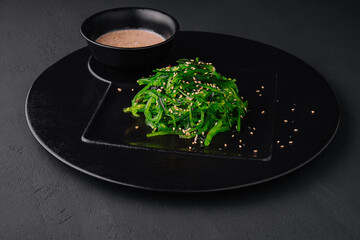 Wakame seaweed salad with sesame seeds