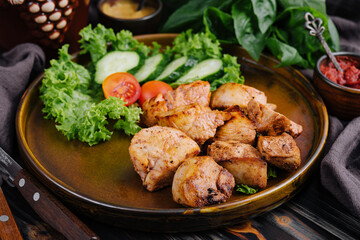 Grilled chicken and salad in a ceramic bowl