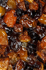 Background with mixed fruits in honey.
