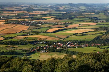 Fototapeta na wymiar Early evening view from the observation tower on Kelcsky Javornik to the villages of P.Lhota and Kunovice. Hostyn hills. Moravia. Czechia.