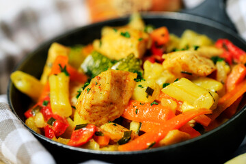 Fototapeta Chicken with vegetables - tasty homemade dinner. obraz