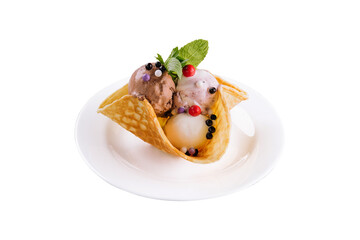 Three scoops of natural organic fruit ice cream in a wafer cup