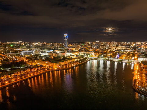 Embankment of the central pond and Plotinka in Yekaterinburg at summer or early autumn night. The historic center of the city of Yekaterinburg, Russia, Aerial View
