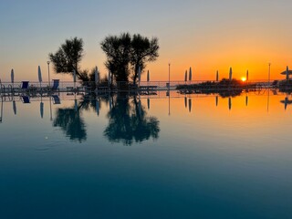 sunset over infinity pool