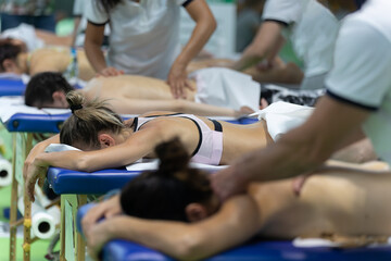 Athlete's Back Massage after Fitness Activity -  Wellness and Sport