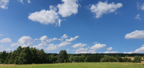 A beautiful panorama of the Dry Mountains near Wałbrzych on a sunny summer day.