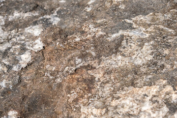 texture of old stone rock surface.Brown stone or rock background and texture.horizontal black stone texture for pattern and background
