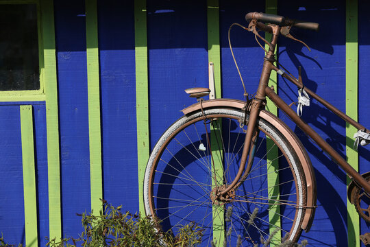 bike on painted house in Oleron island , France