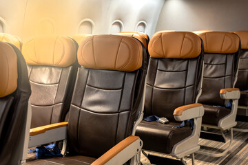 Empty leather seat rows on airplane, Airline Business Concept