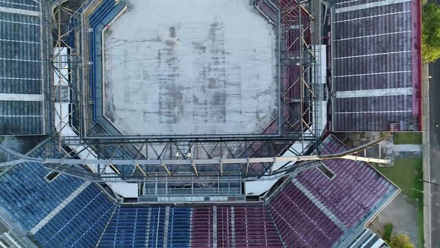 Drone takes a pan shot of the colorful arena of Bumb&oacute;dromo where the Boi-Bumb&aacute; Festival are held and streets of Parintins, Brazil