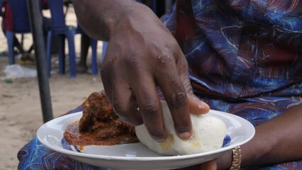 Africa Nigeria local popular dishes known as ewedu and eba .