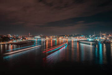 Fototapeta na wymiar Cityscape view at night of Istanbul city and Bosphorus strait 