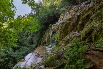 Krushunski waterfalls with turqoize waters and beautiful ecosystem