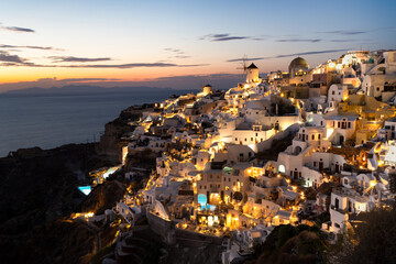 Sunset and Golden Hour landscape of Oia village in Santorini. Cyclades of Greece.