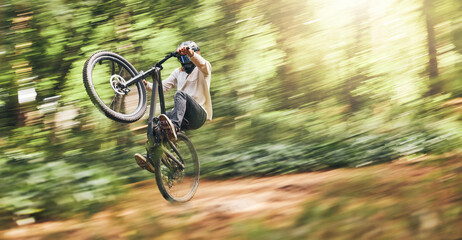 Motion blur of mountain bike man, action jump and bicycle speed adventure, freedom and fast race in...