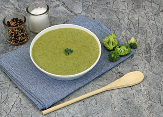 Fresh broccoli soup with ingredients.