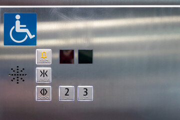 Image of disabled lift button. Stainless steel elevator panel push buttons for blind and disability...