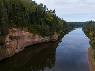 Sandstone cliffs with a tourist trail on the banks of the Gauja River, Gauja National Park