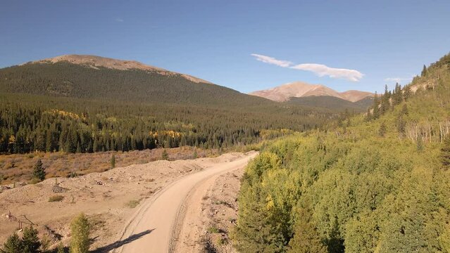 Rising Above A Gravel Road With Little Baldy Mountain And Mount Silverheels In The Distance.  Rocky Mountains In The Fall Filmed Along Boreas Pass Road Near The Town Of Como, Colorado.