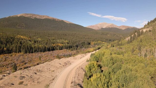 Little Baldy Mountain And Mount Silverheels In The Distance As The Cameras Lifts Up Above A Gravel Road.  Rocky Mountains In The Fall Filmed Along Boreas Pass Road Near The Town Of Como, Colorado.