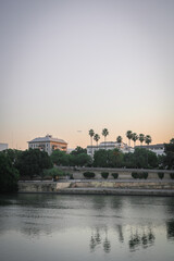 sunset over the river sevilla spain summer sun blue hour sunrise old building classic style city 