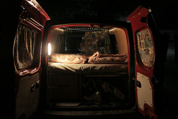 car van campervan in portugal red van renault camping sunset golden hour vacation night bed 