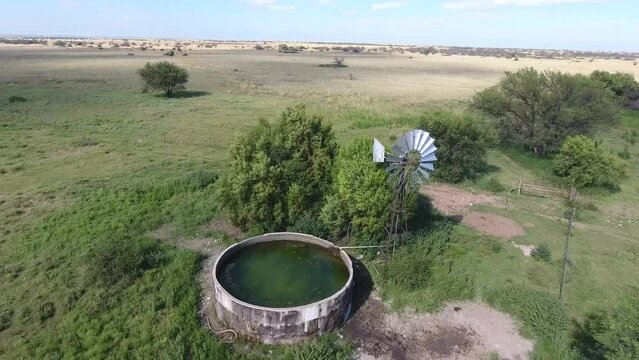 Farm dam surrounded by fields