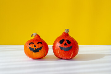 Funny Halloween pumpkin ghosts heads. Halloween holiday background