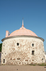 Fototapeta na wymiar Round Tower fortification built in 1500's by the order of Gustav I of Sweden as an arsenal at the market square of Vyborg in Leningrad Oblast, Russia