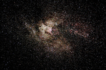Milky way galaxy and fiery starry sky. Beautiful sky with shining stars and star trails