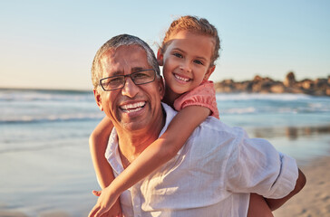 Family, child and grandpa on beach vacation with smile, love and fun senior man carrying girl on back on tropical summer trip. Active grandparent and happy kid laughing during piggy back ride by sea