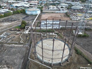 aerial photo of an industrial Steel structure, empty victorian gas storage tank for bulk storage of...