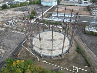 aerial photo of an industrial Steel structure, empty victorian gas storage tank for bulk storage of...