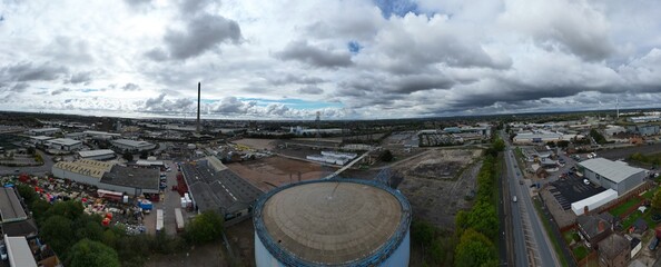 aerial photo of an industrial Steel structure of empty 1960s gas storage tank for bulk storage of...