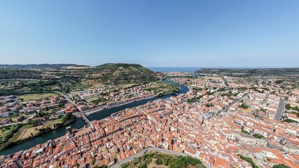 Scenic bird's eye view of Bosa in Sardinia with traditional architecture in Italy