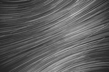Abstract Bewitching Illusion Of Star Trails. Spin Of Unusual Amazing Stars Effect In Sky. Meteors Trace On Night Dark Blue Sky Background. Soft Colors.