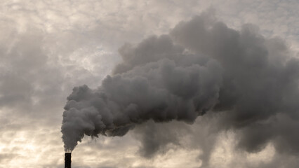 Smoking chimneys of a chemical plant emitting huge amounts of greenhouse gases.Air environment...