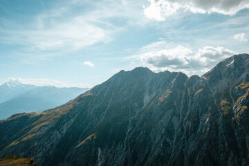 Fototapeta premium Swiss mountains forest in switserland sun sunset clouds hiking in a landscape